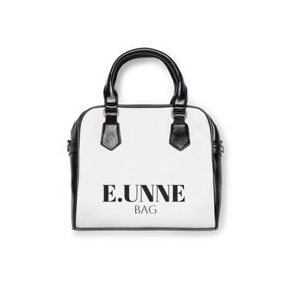 E.UNNE Classic Shoulder Handbag — Elegant White &amp; Black Leather Tote with black handles and a sleek design.