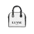 E.UNNE Classic Shoulder Handbag — Elegant White & Black Leather Tote with black handles and a sleek design.
