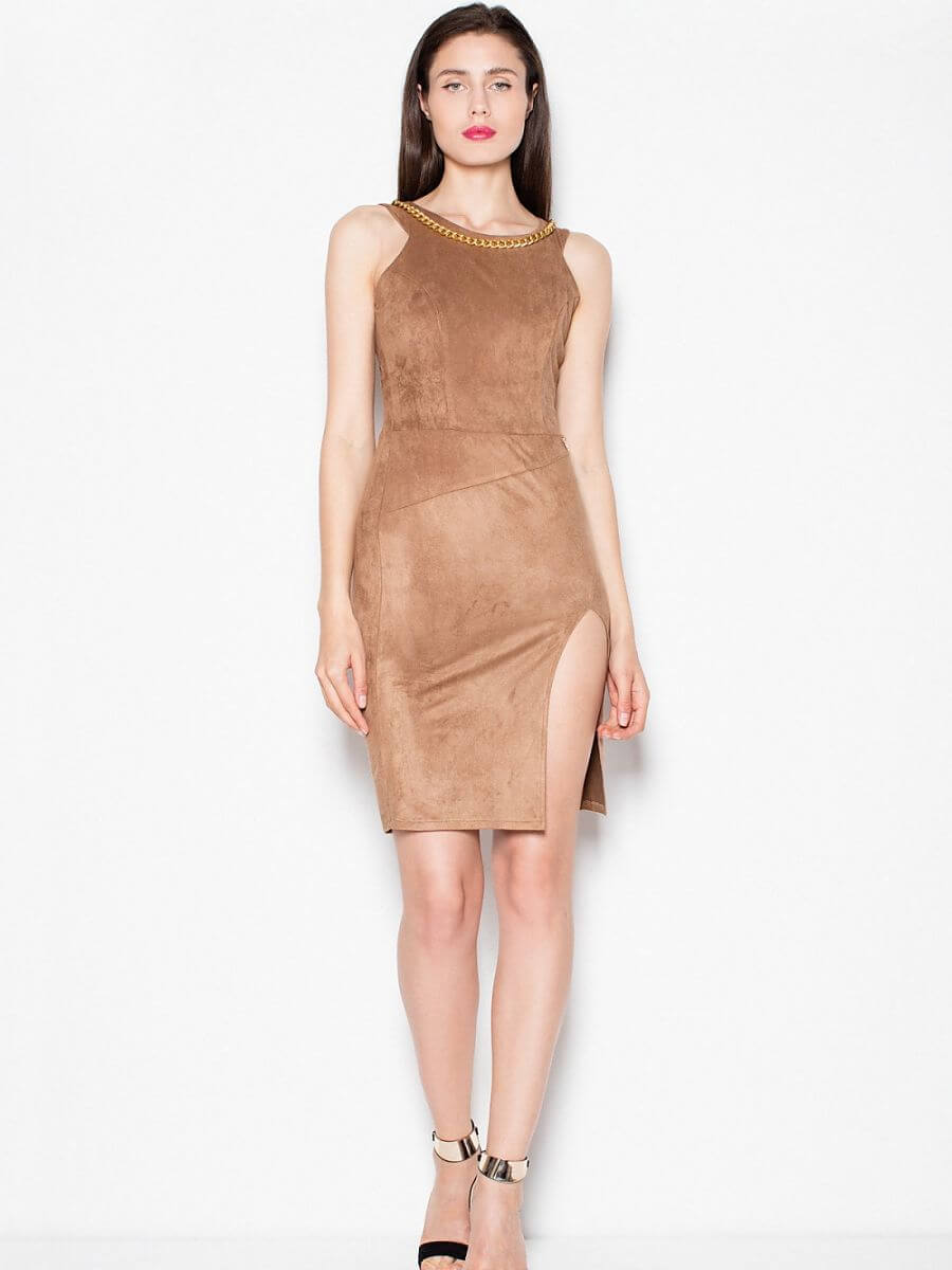 Model wearing a stylish suede evening dress with thigh-high cut and jeweled chain, perfect for formal occasions.